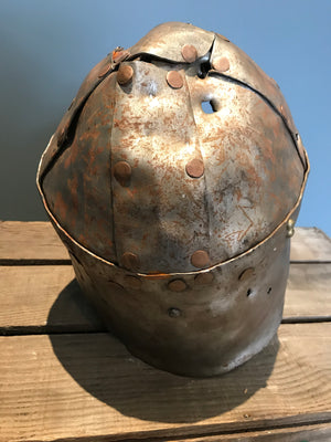 A metal re-enactment armour helmet for a warrior or knight