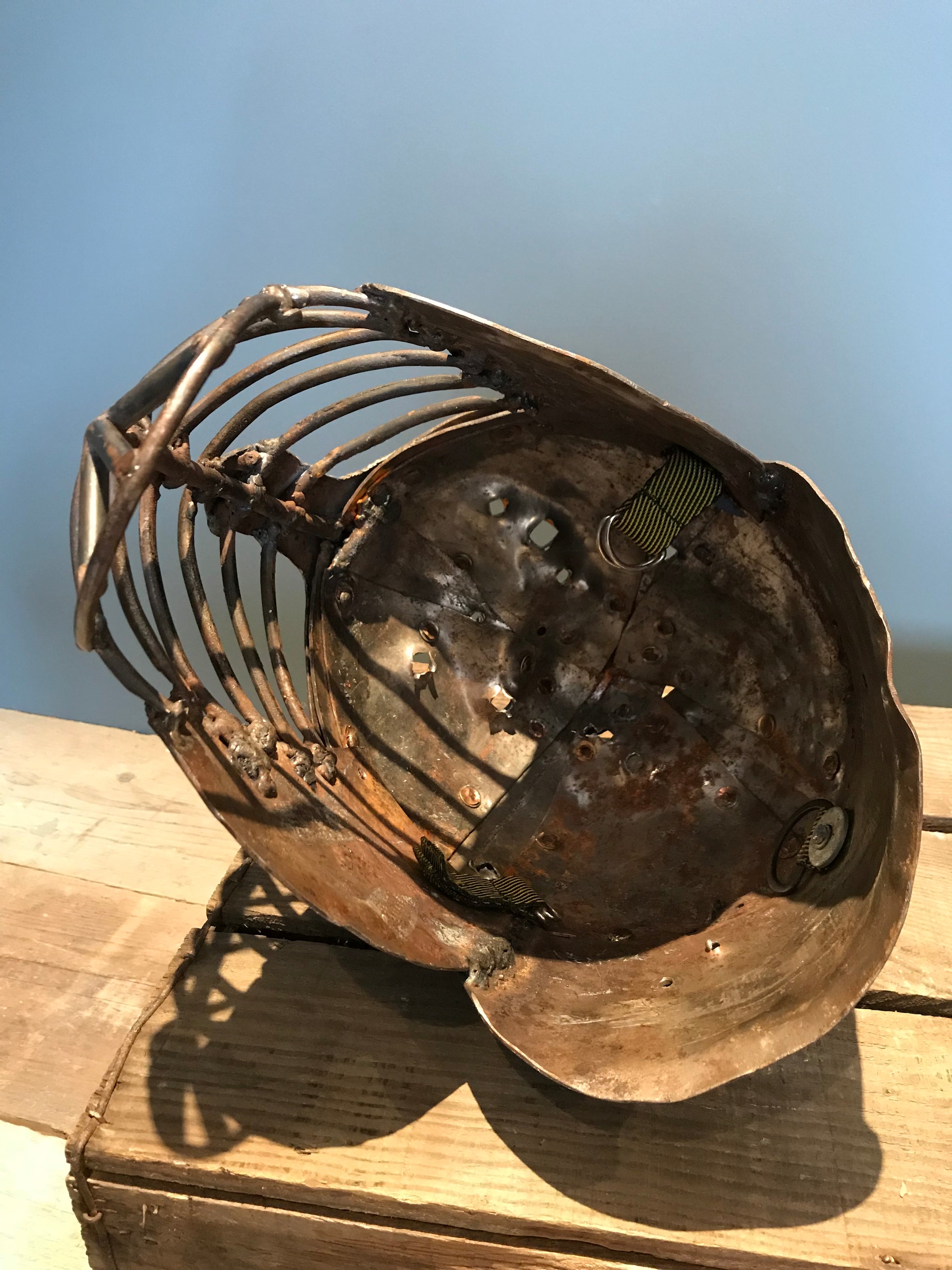 A metal re-enactment armour helmet for a warrior or knight