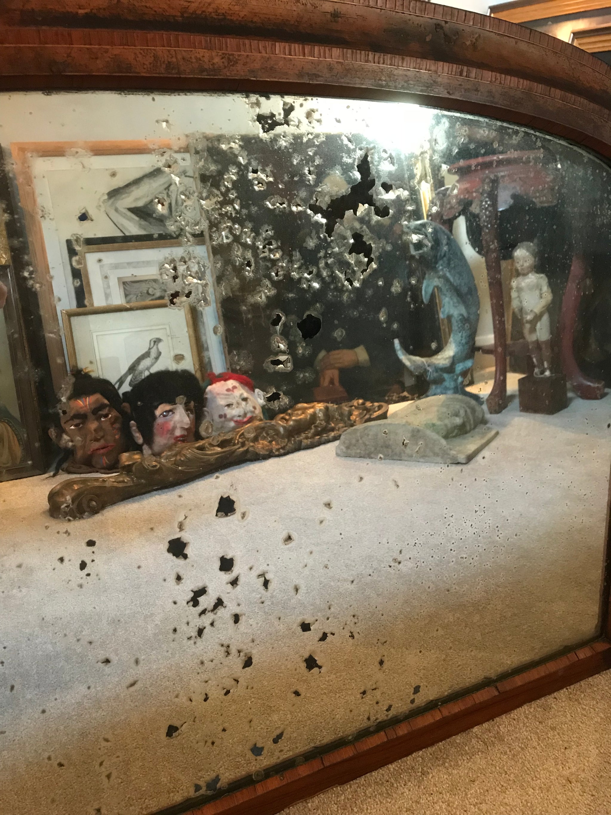 A large inlaid arched overmantle mirror- heavily distressed