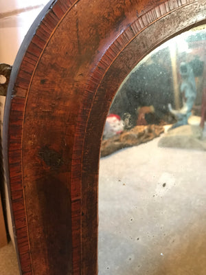 A large inlaid arched overmantle mirror- heavily distressed