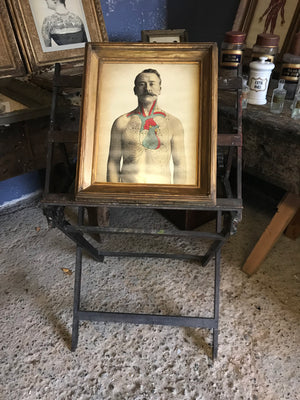 An unusual and rare wooden floor standing rack easel