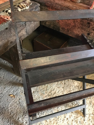 An unusual and rare wooden floor standing rack easel