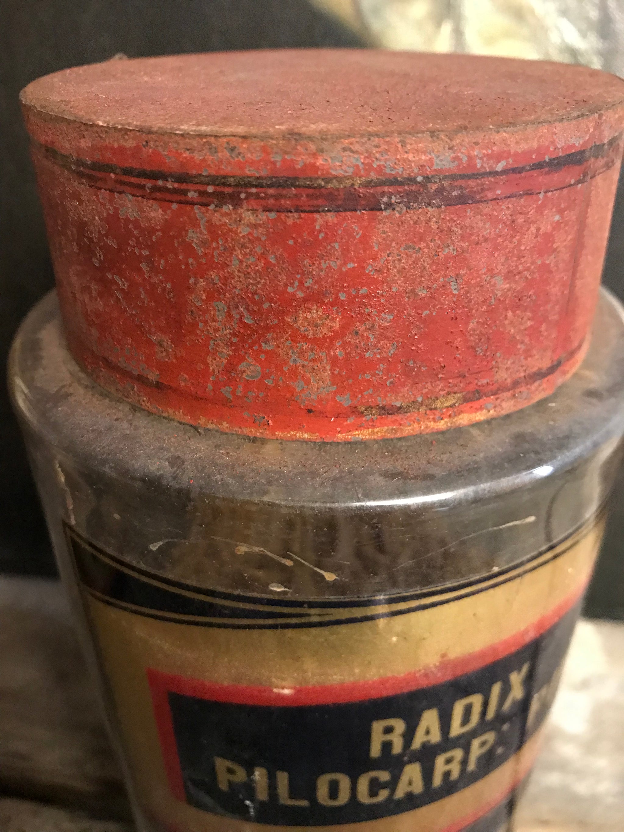 A collection of six gilt label large glass apothecary jars