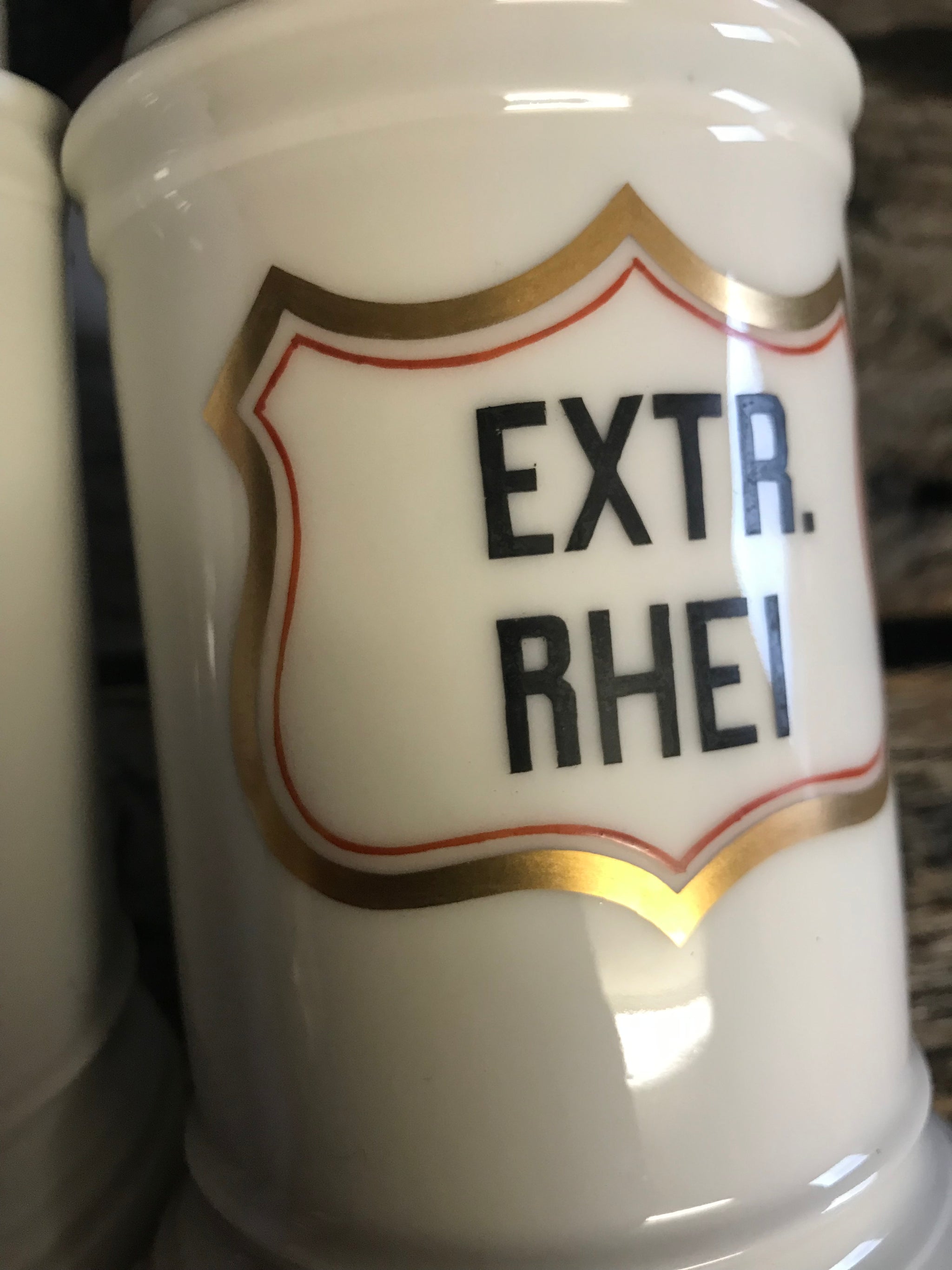 A pair of large white porcelain apothecary jars with lids