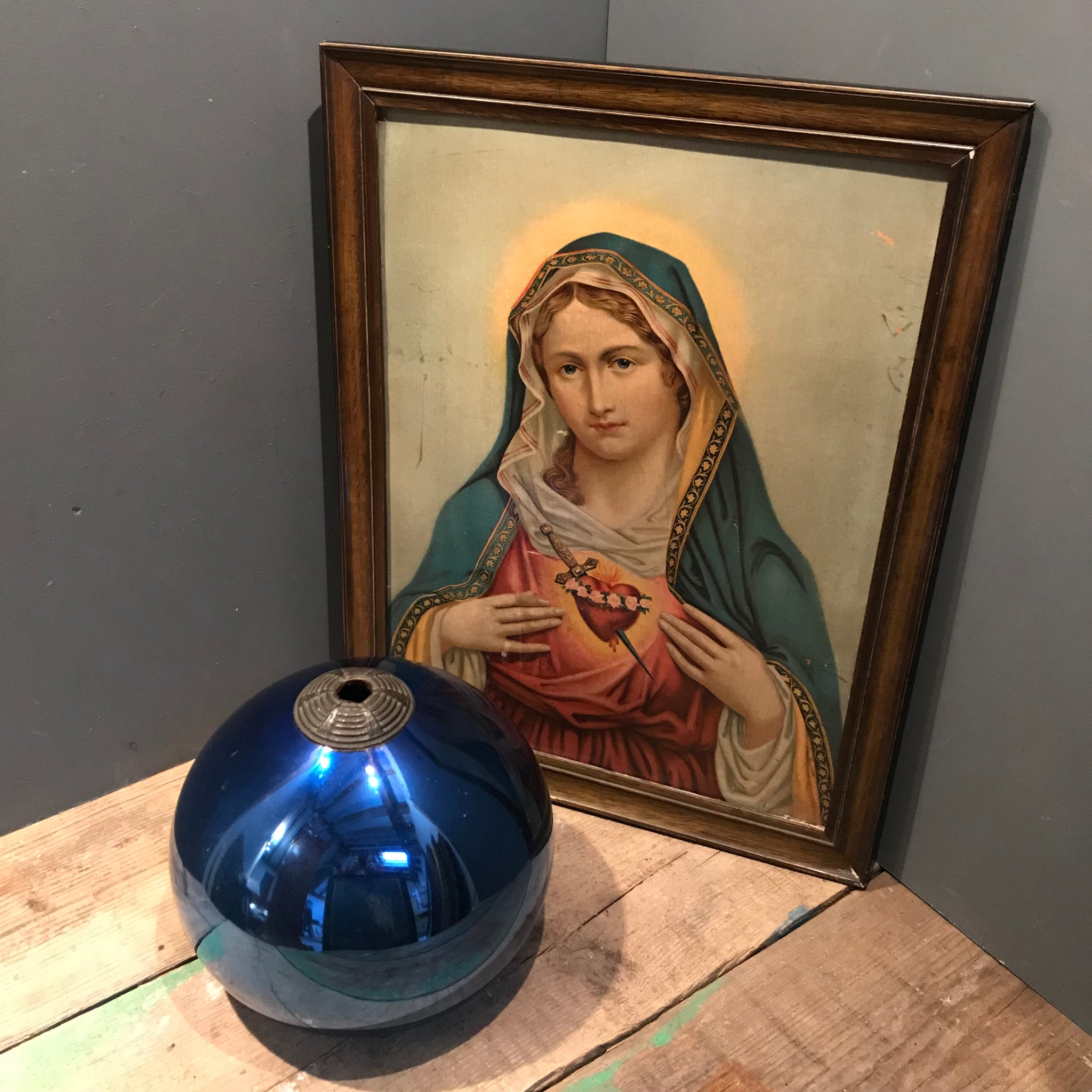 A cobalt blue mercury glass witches ball 33”