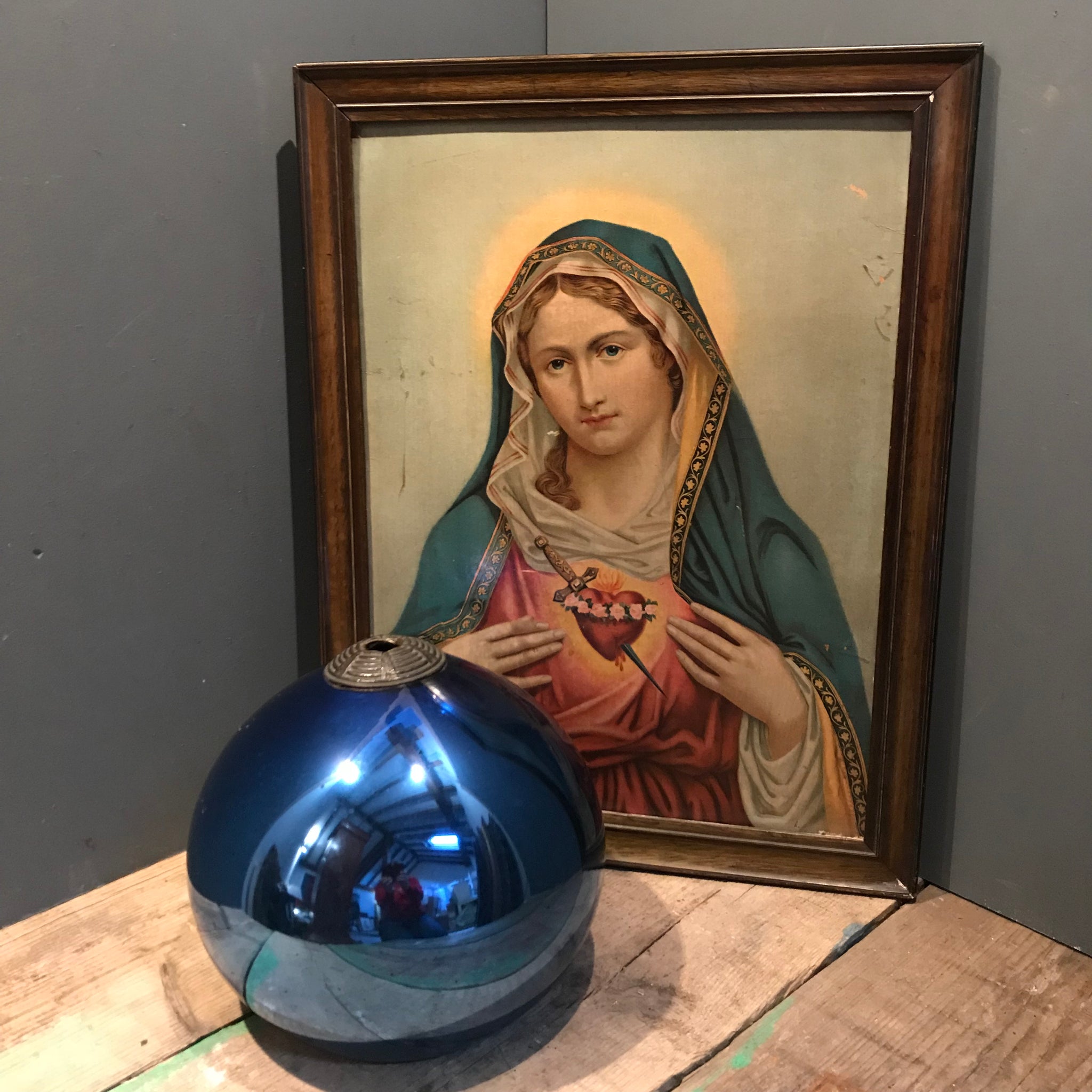 A cobalt blue mercury glass witches ball 33”