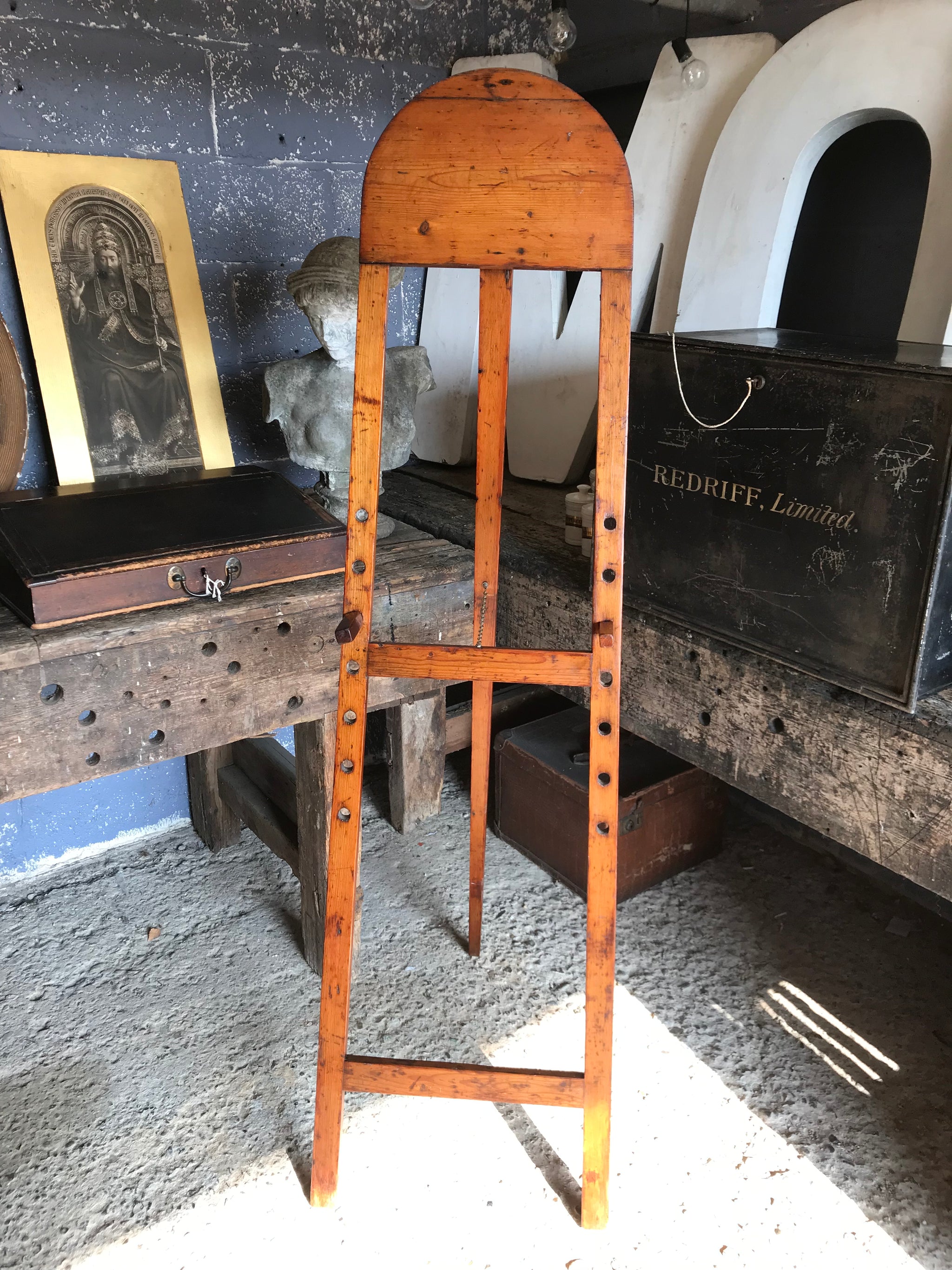 A flat full size floor standing studio easel