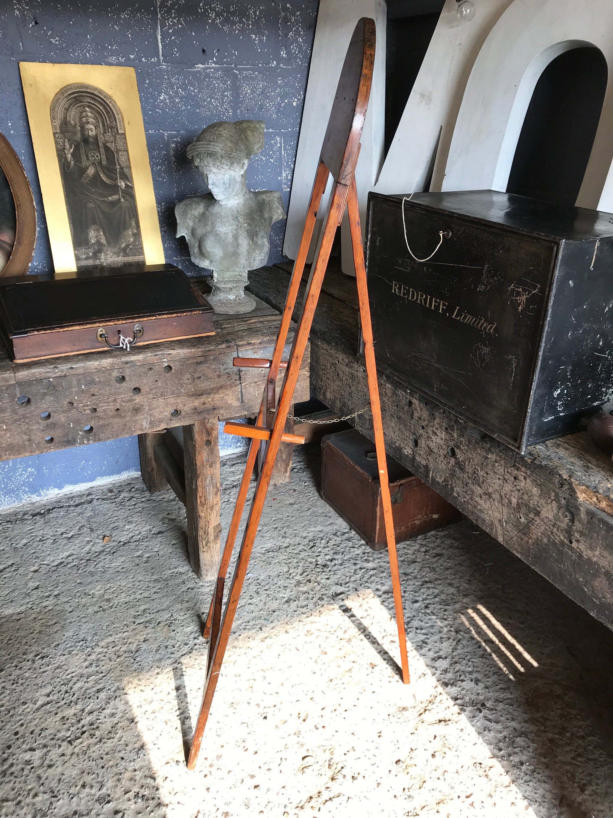 A flat full size floor standing studio easel