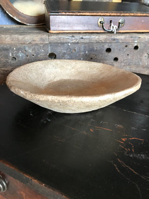 A pair of handmade rough hewn marble bowls