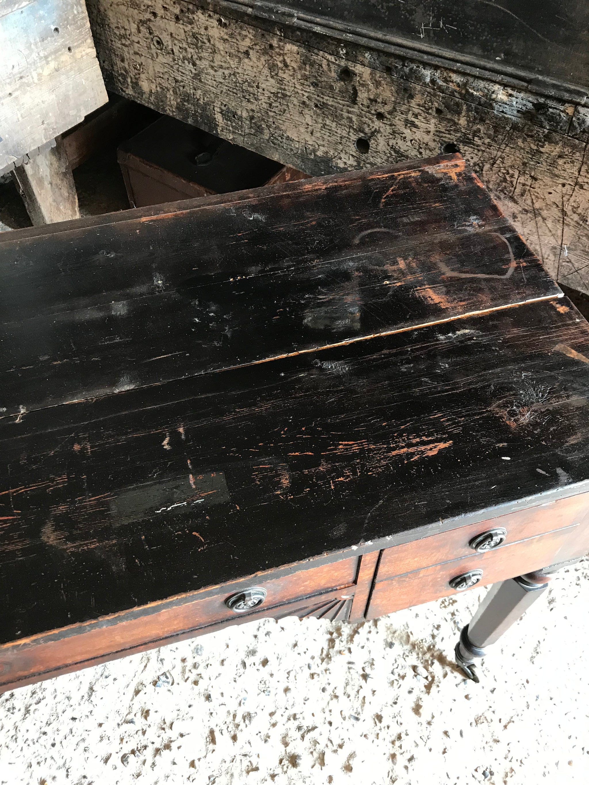 A 19th Century Georgian console table with brass castors