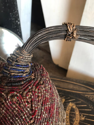 An African glass bead woven cone hat from Zaire