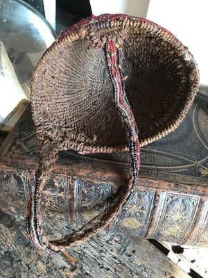 An African glass bead woven cone hat from Zaire