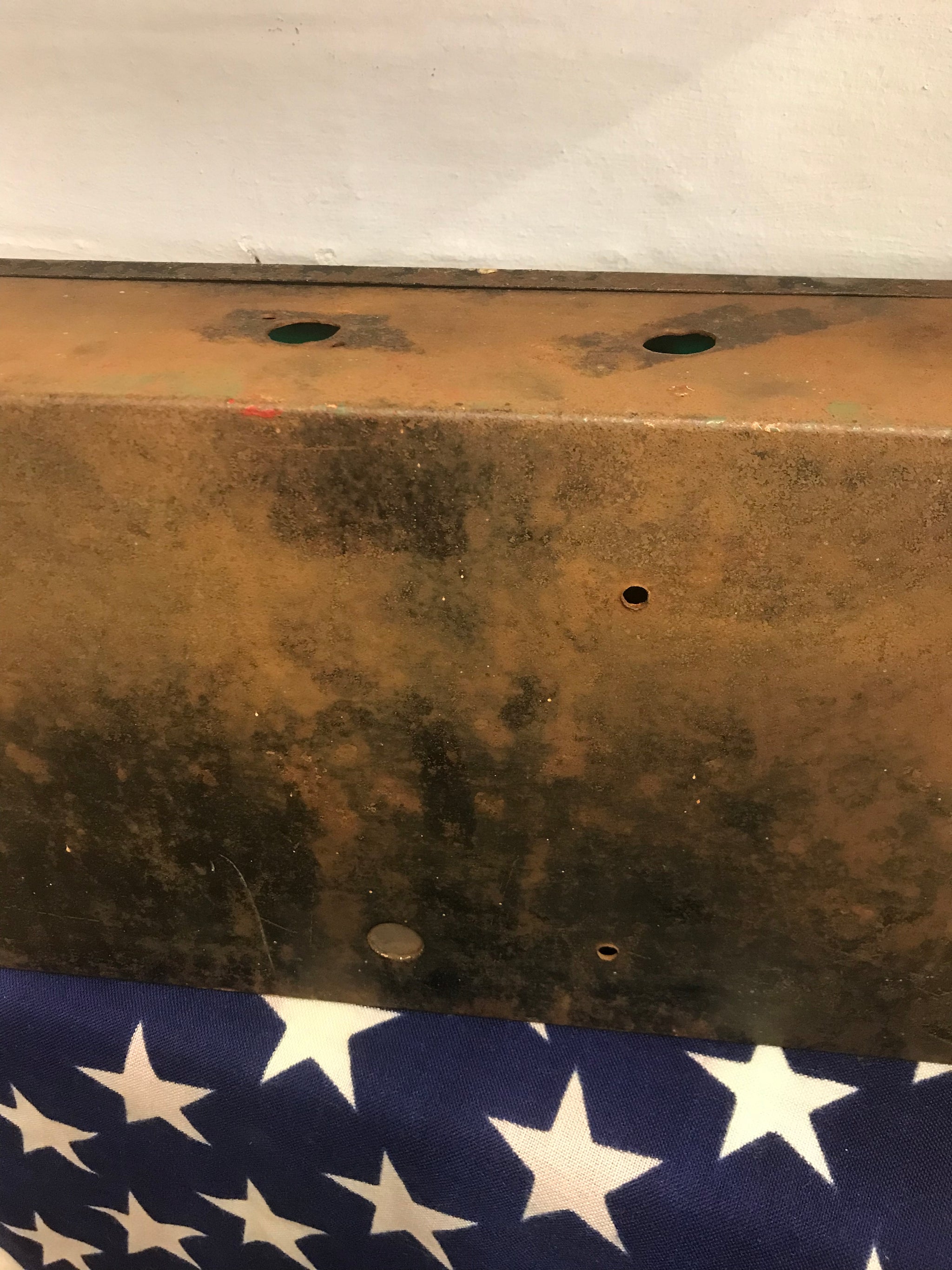 A metal emergency exit light box sign