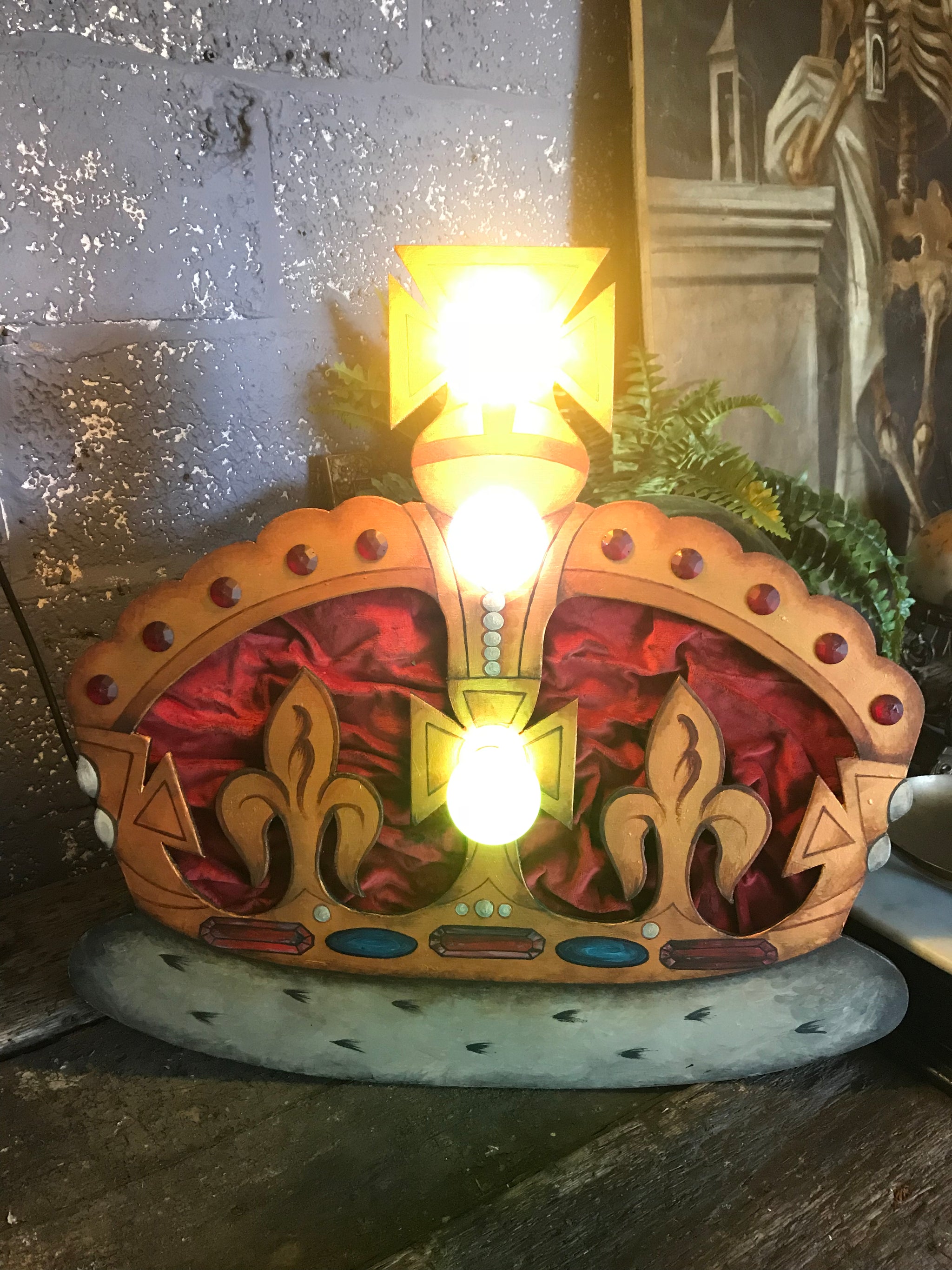 A hand painted illuminated royal crown fairground panel