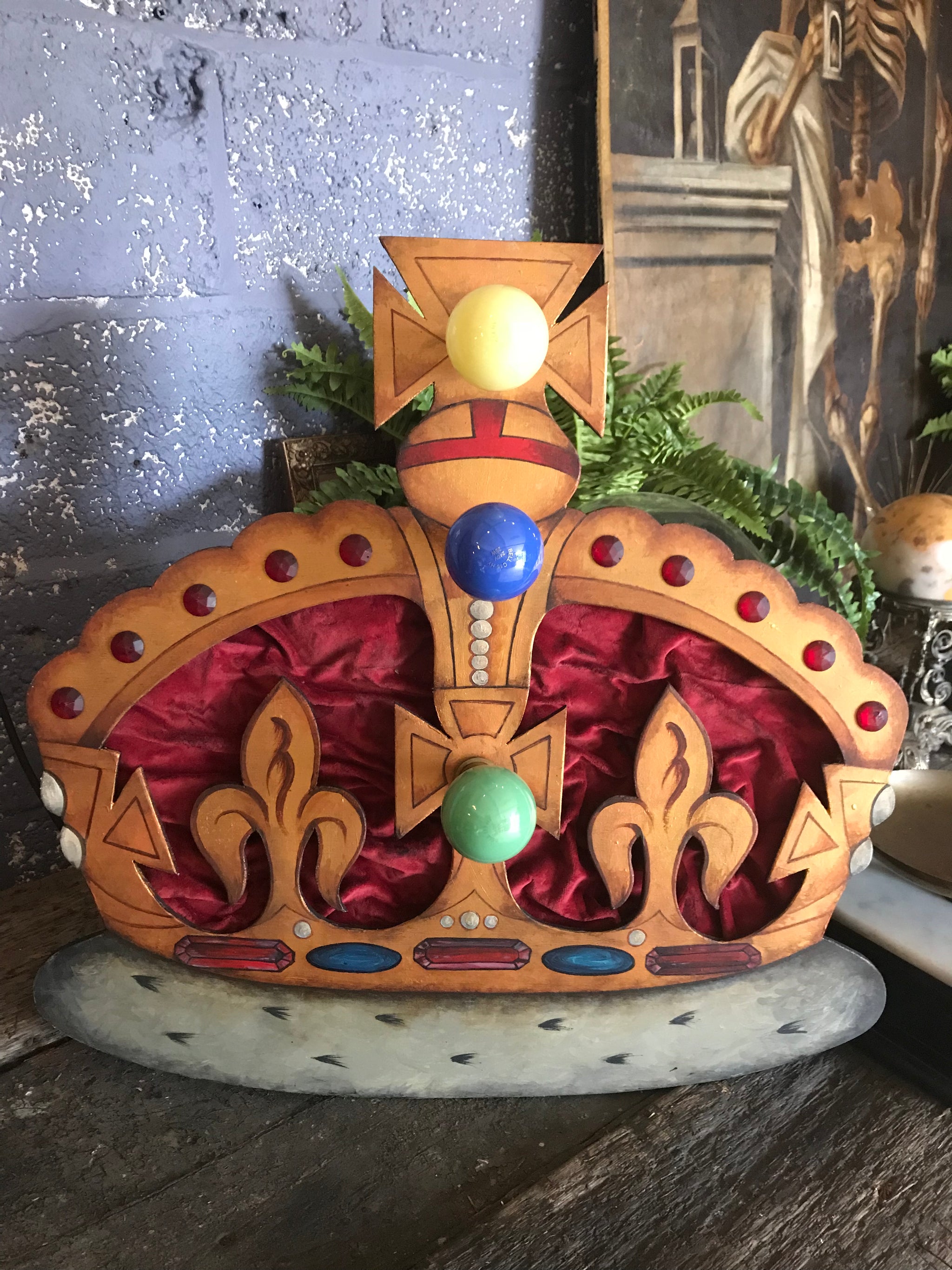 A hand painted illuminated royal crown fairground panel