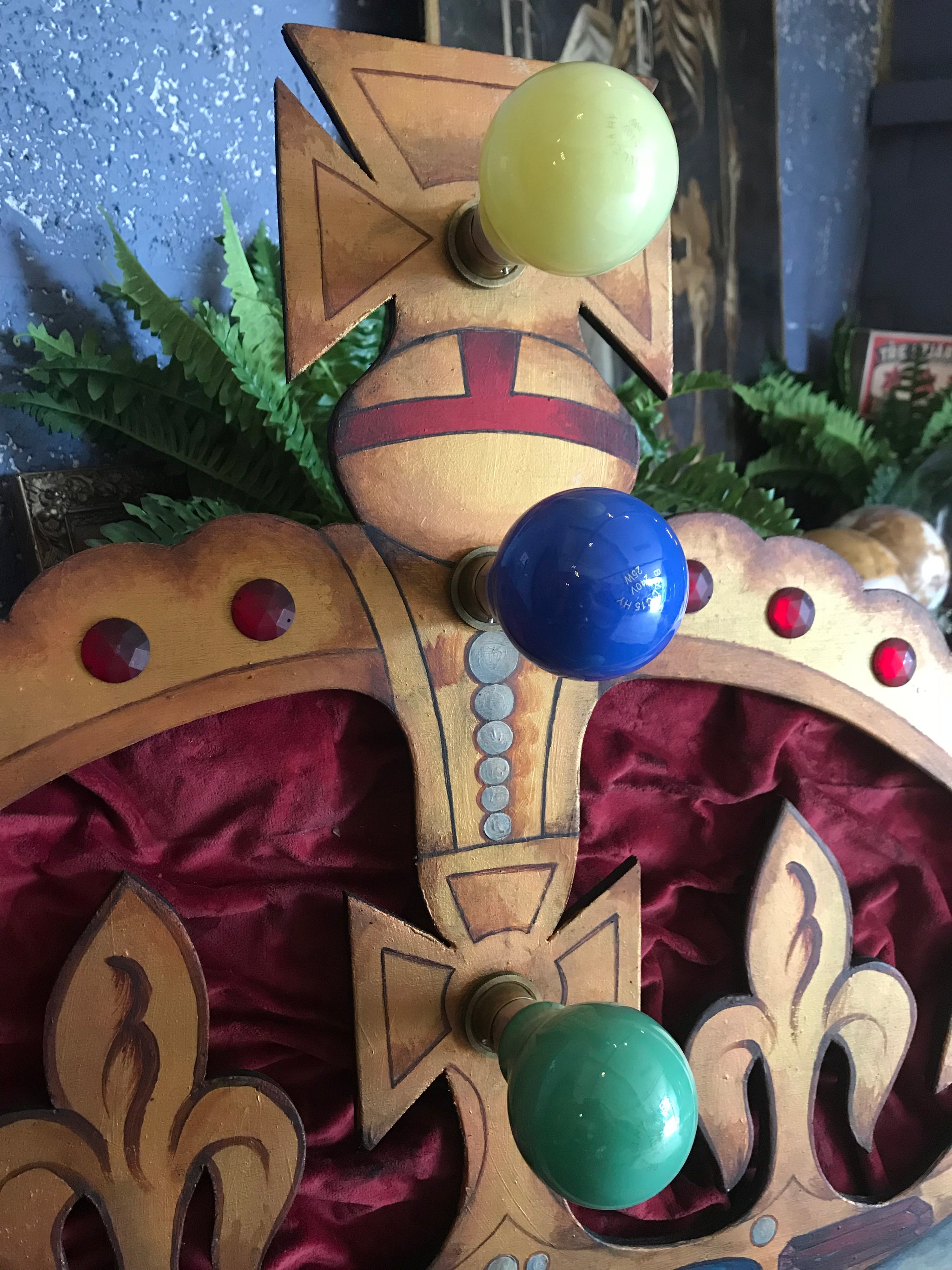 A hand painted illuminated royal crown fairground panel