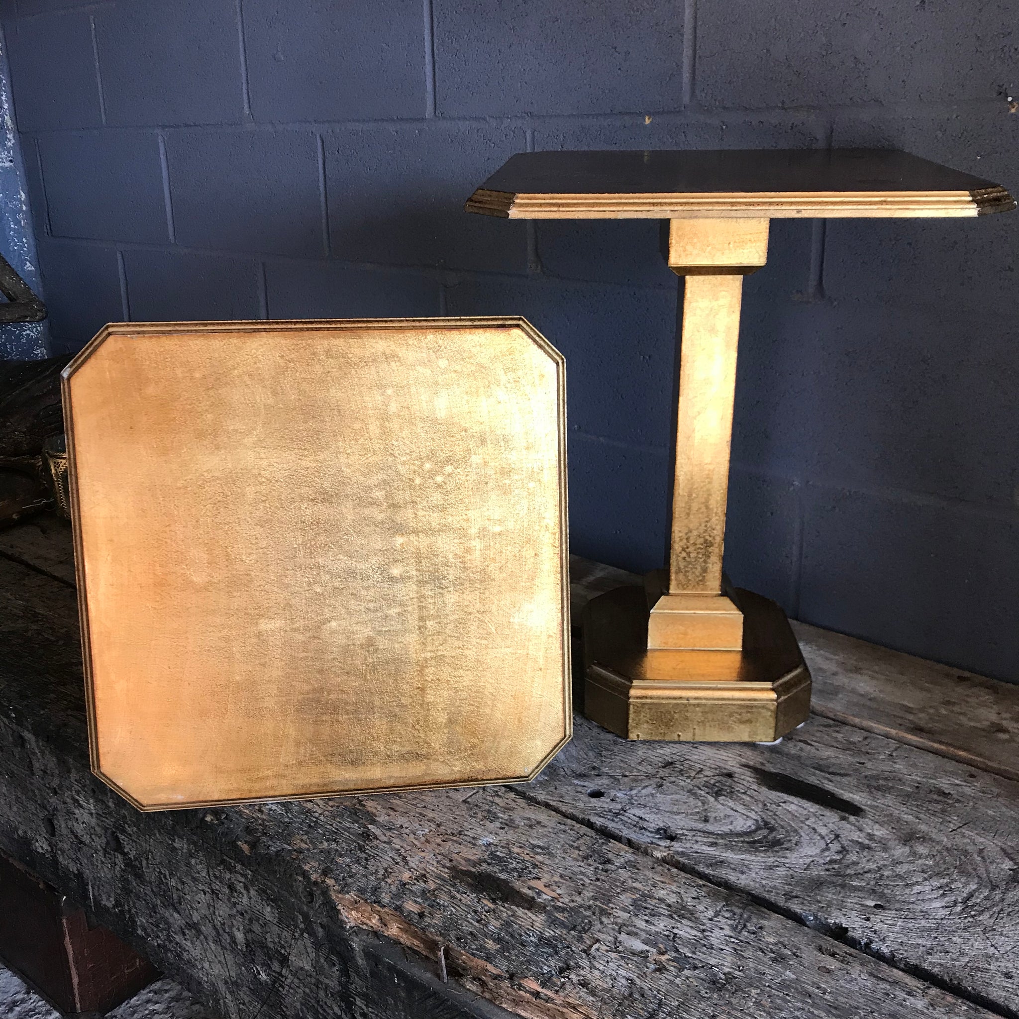 A pair of Art Deco Hollywood Regency gilt side tables