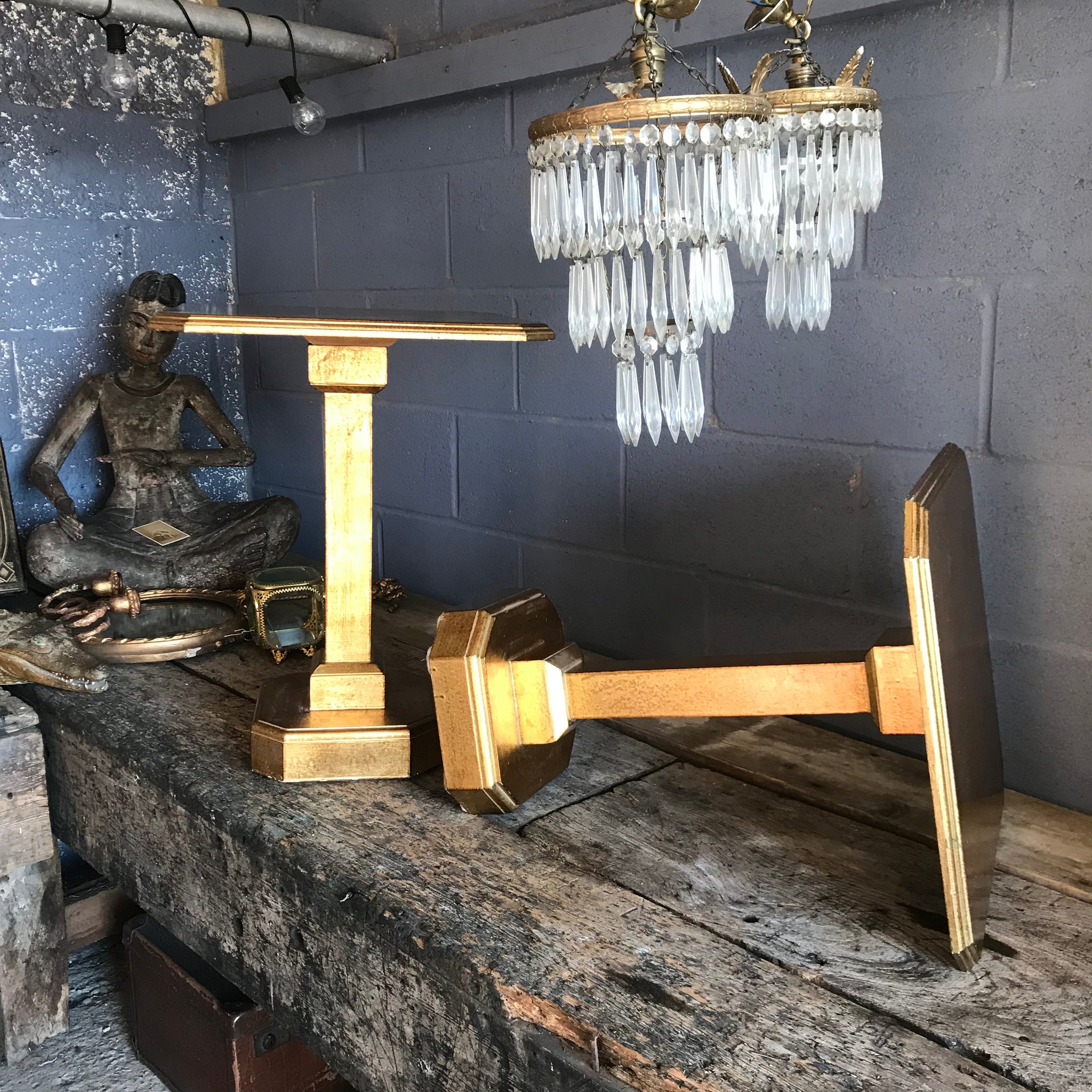 A pair of Art Deco Hollywood Regency gilt side tables