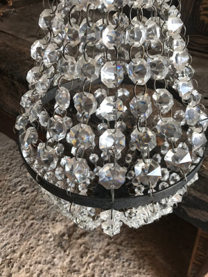 An Empire-style bag and tent crystal chandelier