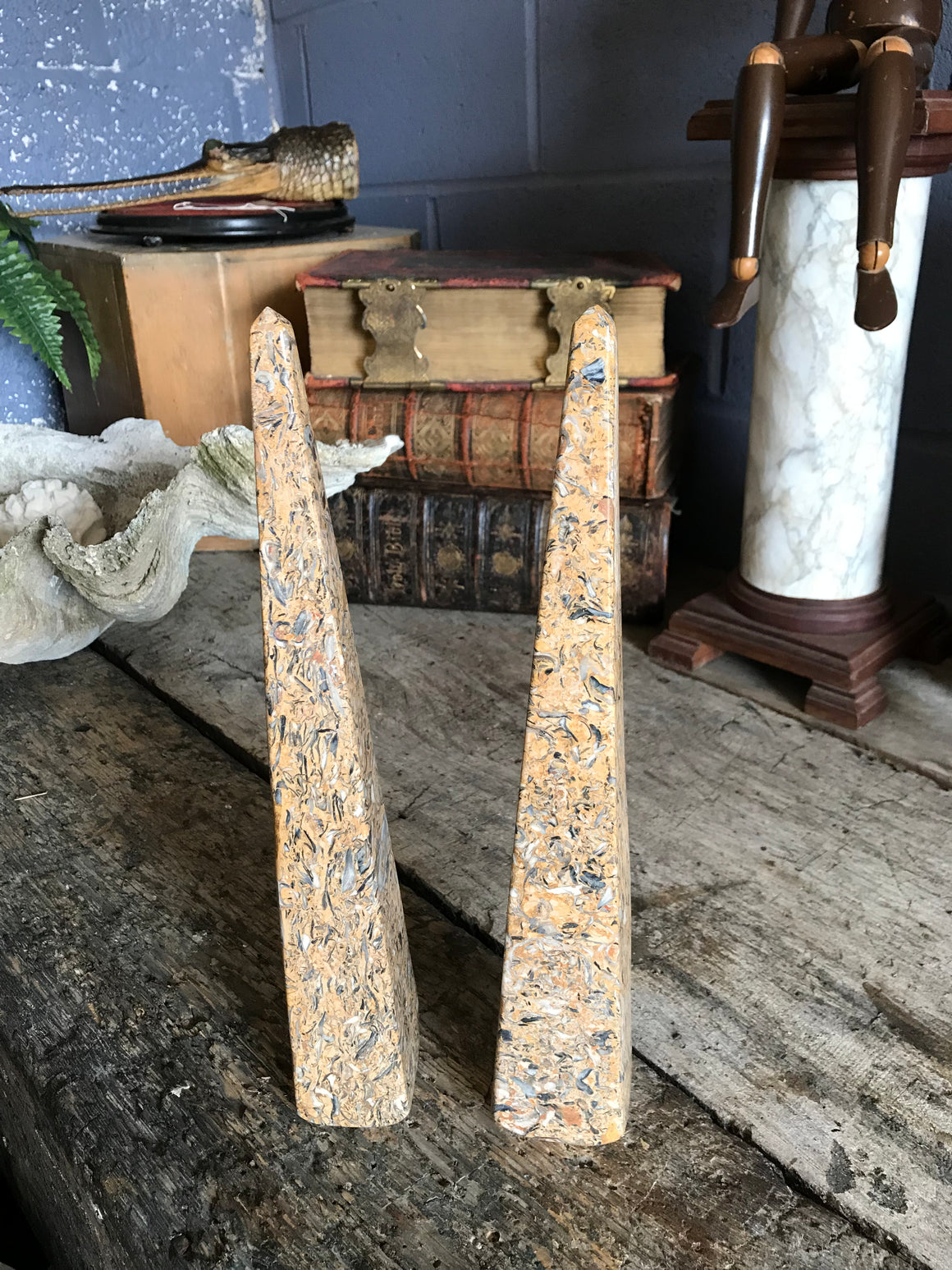 A pair of marble obelisks