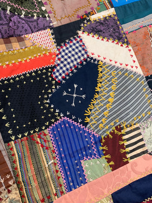 An American hand sewn patchwork textile quilt sampler