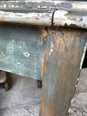 A vintage rustic occasional table