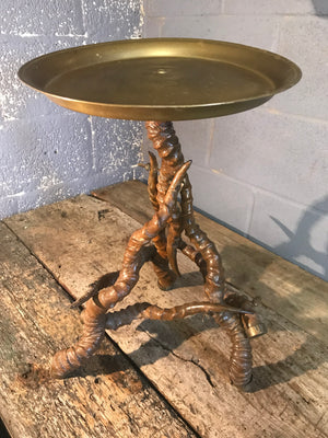 A unique brass side table with black buck antelope horn legs