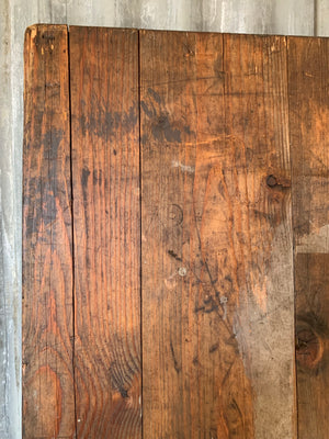 A wooden plank top folding trestle table - Table 3