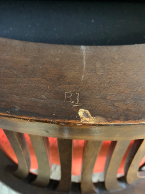 An oak rotating banker's desk chair