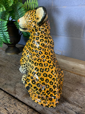A large Hollywood Regency leopard cub statue