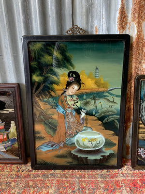 A very large reverse painted glass Geisha picture
