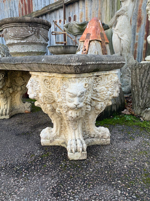 A set of cast stone Triton benches and stools