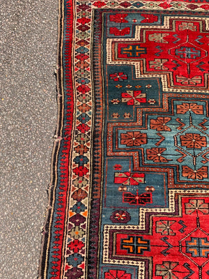 A red blue ground Persian rectangular rug 150cm x 119cm