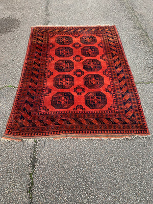 A sunset red ground Bokhara rectangular rug- 200cm x 135cm