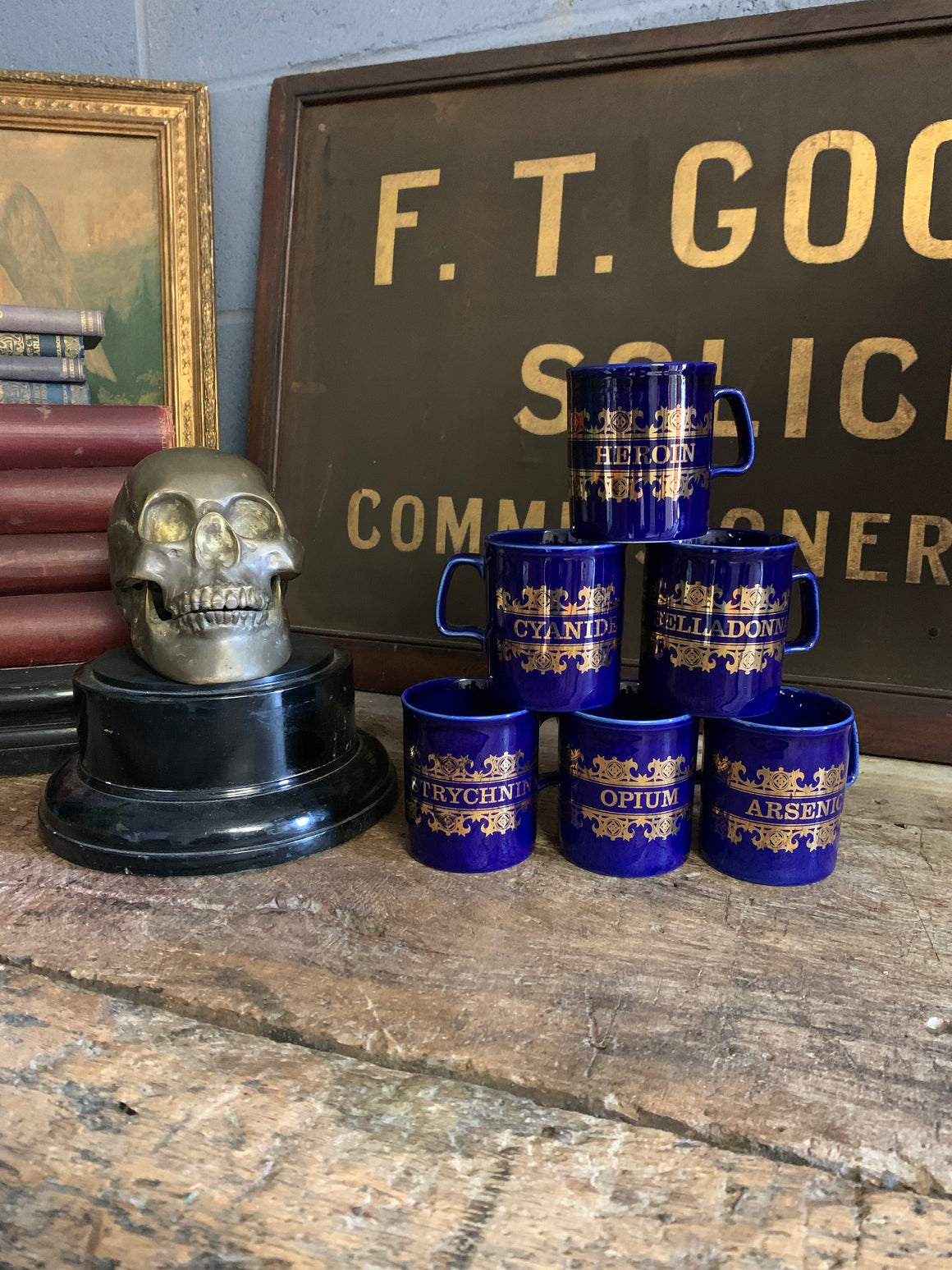 A full set of six cobalt blue apothecary mugs