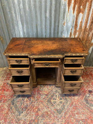 A Victorian limed oak pedestal desk