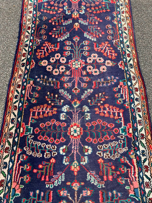 A 16ft Persian blue red ground runner