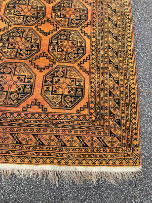 A Persian gold ground rectangular rug - 200 x 142cm