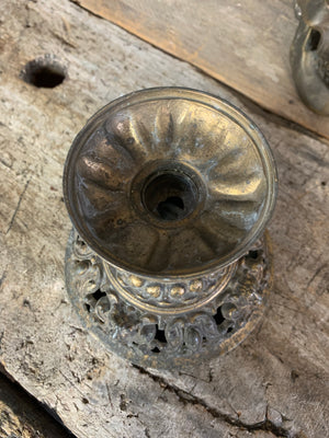 A fortune teller's crystal ball on a gilt leopard head stand