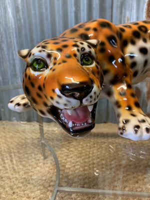 A prowling leopard statue
