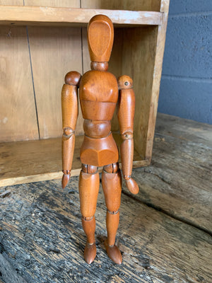 An early 20th Century female wooden lay figure