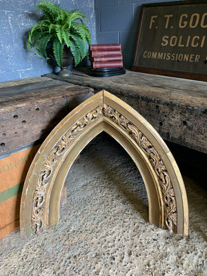 A large carved wooden arch
