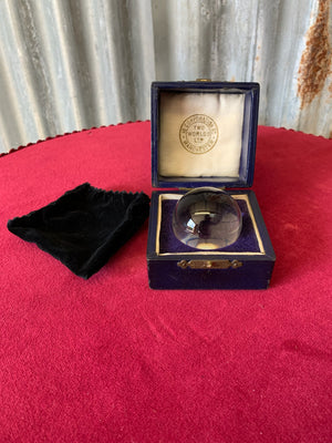 A Victorian Two Worlds Ltd fortune teller's cased crystal ball