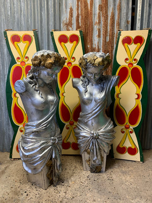 A pair of large life-size nude female pilasters