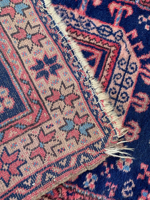 A large Persian blue ground runner - 344 x 82cm