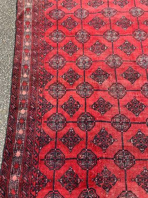 A Persian red ground Bokhara runner - 201 x 118cm