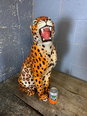 A large ceramic leopard statue made in Italy