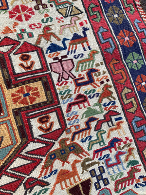 A Persian Caucasian flat weave rectangular rug