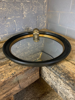 An extra large black and gold convex mirror ~ 85cm