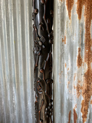 A carved wooden Chinoiserie floor lamp